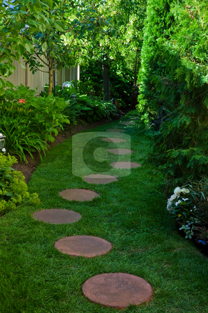To use this stock image in your creative project, please select the size you need over to the right and click the "Add to Cart" button.
Your downloaded image will come with the Cutcaster watermark removed so don’t worry about the watermark you see on this page. Shady Garden Path stock photo, A side garden featuring a shady stepping stone path. by Brenda Carson