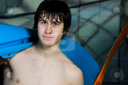 To use this stock image in your creative project, please select the size you need over to the right and click the "Add to Cart" button.
Your downloaded image will come with the Cutcaster watermark removed so don’t worry about the watermark you see on this page. Up and Coming Young Kayaker stock photo, An up and coming young athlete with his trick kayak on his shoulder and paddle in his hand, still wet from his morning practice. by Brenda Carson