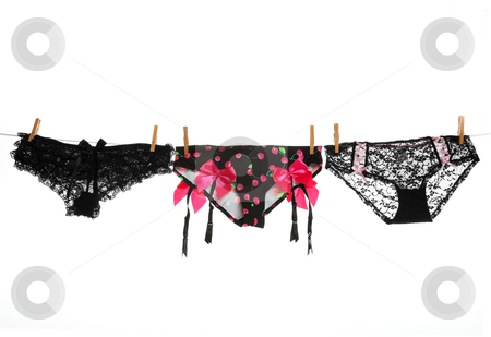 To use this stock image in your creative project, please select the size you need over to the right and click the "Add to Cart" button.
Your downloaded image will come with the Cutcaster watermark removed so don’t worry about the watermark you see on this page. Dirty Laundry stock photo, Three pairs of sexy lingerie hanging on the line to dry. Shot on white background. by Brenda Carson