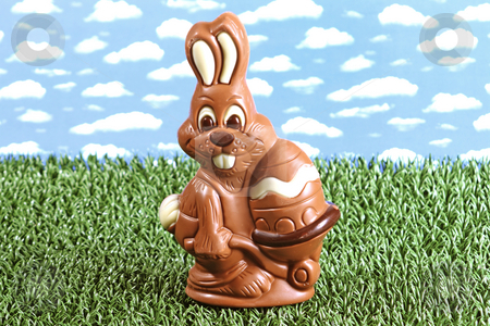 To use this stock image in your creative project, please select the size you need over to the right and click the "Add to Cart" button.
Your downloaded image will come with the Cutcaster watermark removed so don’t worry about the watermark you see on this page. Sweet rabbit stock photo, Chocolate easter rabbit on grass by Birgit Reitz-Hofmann