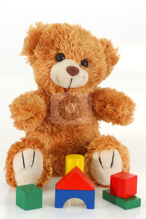 To use this stock image in your creative project, please select the size you need over to the right and click the "Add to Cart" button.
Your downloaded image will come with the Cutcaster watermark removed so don’t worry about the watermark you see on this page. Building bricks stock photo, Cute teddy bear on bright background by Birgit Reitz-Hofmann