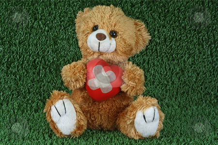 To use this stock image in your creative project, please select the size you need over to the right and click the "Add to Cart" button.
Your downloaded image will come with the Cutcaster watermark removed so don’t worry about the watermark you see on this page. Love sick stock photo, Cute teddy bear with decorative heart on green background by Birgit Reitz-Hofmann
