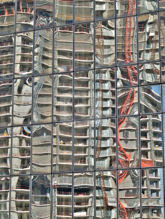 To use this stock image in your creative project, please select the size you need over to the right and click the "Add to Cart" button.
Your downloaded image will come with the Cutcaster watermark removed so don’t worry about the watermark you see on this page. Skyscaper reflection stock photo, Construction site reflecting on glass skyscaper by Laurent Dambies
