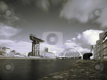 To use this stock image in your creative project, please select the size you need over to the right and click the "Add to Cart" button.
Your downloaded image will come with the Cutcaster watermark removed so don’t worry about the watermark you see on this page. Glasgow clyde river stock photo, Infrared picture of Glasgow clyde river with Finnieston crane and bridge by Laurent Dambies