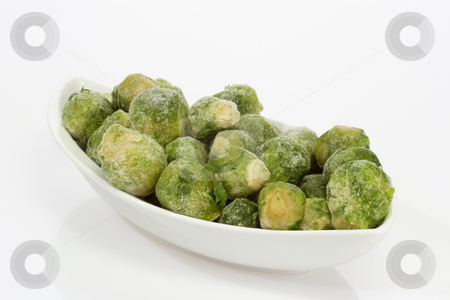 To use this stock image in your creative project, please select the size you need over to the right and click the "Add to Cart" button.
Your downloaded image will come with the Cutcaster watermark removed so don’t worry about the watermark you see on this page. Brussels Sprouts_4 stock photo, Frozen Brussels sprouts in a bowl on bright background by Birgit Reitz-Hofmann