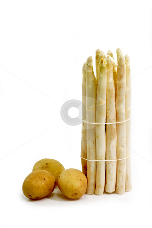 To use this stock image in your creative project, please select the size you need over to the right and click the "Add to Cart" button.
Your downloaded image will come with the Cutcaster watermark removed so don’t worry about the watermark you see on this page. Organic food stock photo, Fresh asparagus and potatoes on bright backgground by Birgit Reitz-Hofmann