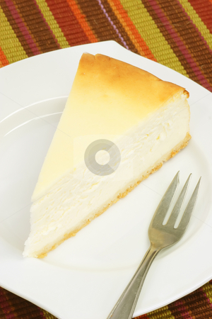 To use this stock image in your creative project, please select the size you need over to the right and click the "Add to Cart" button.
Your downloaded image will come with the Cutcaster watermark removed so don’t worry about the watermark you see on this page. Cheesecake stock photo, Slice of cheesecake on a kitchen plate by Birgit Reitz-Hofmann