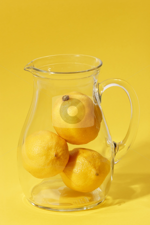 To use this stock image in your creative project, please select the size you need over to the right and click the "Add to Cart" button.
Your downloaded image will come with the Cutcaster watermark removed so don’t worry about the watermark you see on this page. Lemon drink stock photo, Lemons in a glass jug on bright background by Birgit Reitz-Hofmann