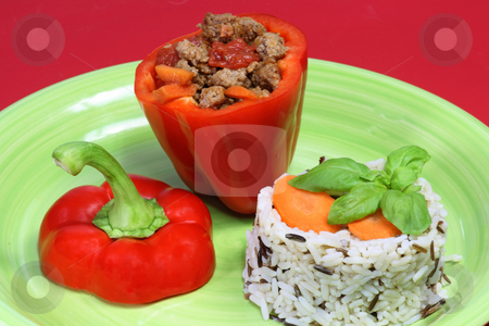 To use this stock image in your creative project, please select the size you need over to the right and click the "Add to Cart" button.
Your downloaded image will come with the Cutcaster watermark removed so don’t worry about the watermark you see on this page. Stuffed paprica stock photo, Stuffed paprica on a plate isolated on red background by Birgit Reitz-Hofmann