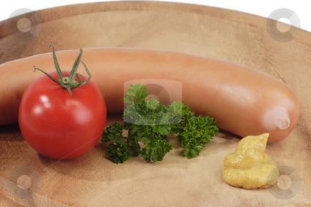 To use this stock image in your creative project, please select the size you need over to the right and click the "Add to Cart" button.
Your downloaded image will come with the Cutcaster watermark removed so don’t worry about the watermark you see on this page. Sausage_1 stock photo, Crisp sausage on a wooden board. Shot in studio by Birgit Reitz-Hofmann