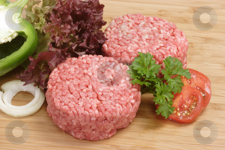 To use this stock image in your creative project, please select the size you need over to the right and click the "Add to Cart" button.
Your downloaded image will come with the Cutcaster watermark removed so don’t worry about the watermark you see on this page. Meatballs stock photo, Raw mincemeat in detail on brown background by Birgit Reitz-Hofmann