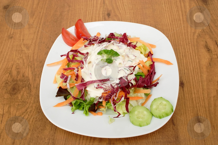 To use this stock image in your creative project, please select the size you need over to the right and click the "Add to Cart" button.
Your downloaded image will come with the Cutcaster watermark removed so don’t worry about the watermark you see on this page. Fresh salad stock photo, Fresh salad on a plate on brown background by Birgit Reitz-Hofmann