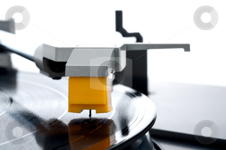 To use this stock image in your creative project, please select the size you need over to the right and click the "Add to Cart" button.
Your downloaded image will come with the Cutcaster watermark removed so don’t worry about the watermark you see on this page. A horizontal macro of a vinyl record be played on a turntable stock photo, A horizontal macro of a vinyl record be played on a turntable by Vince Clements