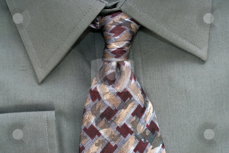 To use this stock image in your creative project, please select the size you need over to the right and click the "Add to Cart" button.
Your downloaded image will come with the Cutcaster watermark removed so don’t worry about the watermark you see on this page. Closeup Shirt and Tie stock photo, Closeup view of a shirt and neck tie by Richard Nelson