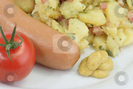 To use this stock image in your creative project, please select the size you need over to the right and click the "Add to Cart" button.
Your downloaded image will come with the Cutcaster watermark removed so don’t worry about the watermark you see on this page. Potato salad_7 stock photo, Crisp cooked sausage with potato salad on bright background by Birgit Reitz-Hofmann