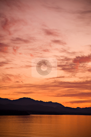 To use this stock image in your creative project, please select the size you need over to the right and click the "Add to Cart" button.
Your downloaded image will come with the Cutcaster watermark removed so don’t worry about the watermark you see on this page. Strait of Juan de Fuca Sunset stock photo, A beautiful sunset over the Strait of Juan de Fuca in Sequim, Washington. by Travis Manley