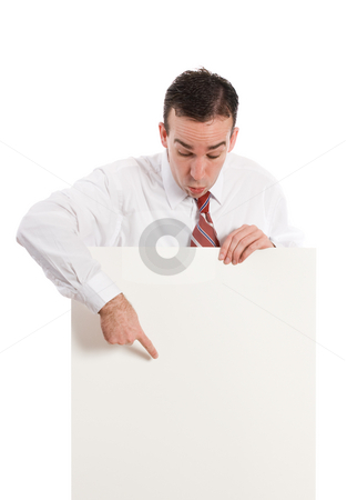 To use this stock image in your creative project, please select the size you need over to the right and click the "Add to Cart" button.
Your downloaded image will come with the Cutcaster watermark removed so don’t worry about the watermark you see on this page. Look Here stock photo, A businessman pointing to a spot the paper sign where you should look, isolated against a white background by Richard Nelson