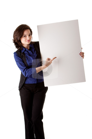 To use this stock image in your creative project, please select the size you need over to the right and click the "Add to Cart" button.
Your downloaded image will come with the Cutcaster watermark removed so don’t worry about the watermark you see on this page. Young business woman with white board stock photo, Happy smiling beautiful young caucasian brunette business student woman standing next to and holding a white blank board and pointing at it, isolated by Paul Hakimata
