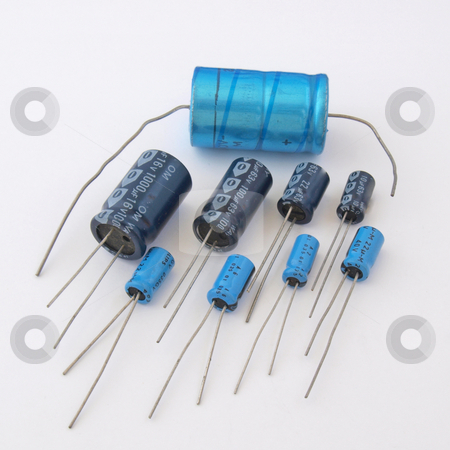 To use this stock image in your creative project, please select the size you need over to the right and click the "Add to Cart" button.
Your downloaded image will come with the Cutcaster watermark removed so don’t worry about the watermark you see on this page. Assorted capacitors. stock photo, Assorted capacitors as used in a computer. by Ian Langley