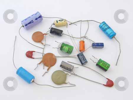 To use this stock image in your creative project, please select the size you need over to the right and click the "Add to Cart" button.
Your downloaded image will come with the Cutcaster watermark removed so don’t worry about the watermark you see on this page. Assorted capacitors stock photo, Assorted capacitors as used in a computer. by Ian Langley