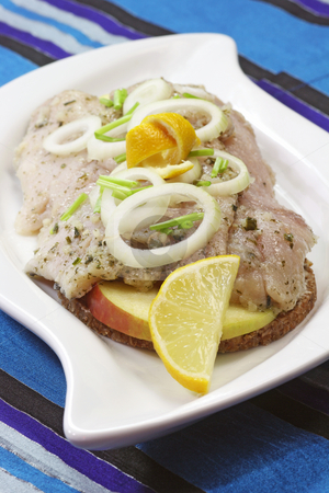 To use this stock image in your creative project, please select the size you need over to the right and click the "Add to Cart" button.
Your downloaded image will come with the Cutcaster watermark removed so don’t worry about the watermark you see on this page. Fresh herring stock photo, Gourmet young herring fillets. Studio Shot by Birgit Reitz-Hofmann