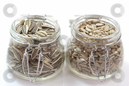 To use this stock image in your creative project, please select the size you need over to the right and click the "Add to Cart" button.
Your downloaded image will come with the Cutcaster watermark removed so don’t worry about the watermark you see on this page. Sunflower seeds stock photo, Sunflower seeds on a bright background by Birgit Reitz-Hofmann