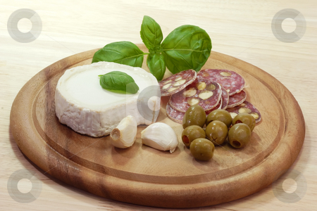 To use this stock image in your creative project, please select the size you need over to the right and click the "Add to Cart" button.
Your downloaded image will come with the Cutcaster watermark removed so don’t worry about the watermark you see on this page. Appetizer stock photo, Gourmet food on a brown kitchen board by Birgit Reitz-Hofmann