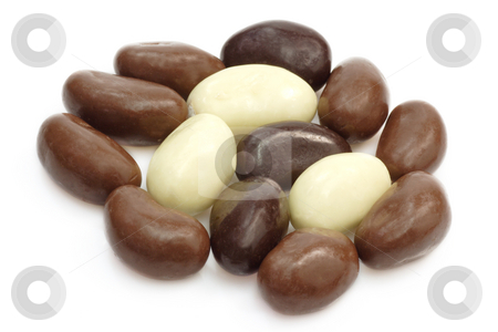 To use this stock image in your creative project, please select the size you need over to the right and click the "Add to Cart" button.
Your downloaded image will come with the Cutcaster watermark removed so don’t worry about the watermark you see on this page. Chocolate almopnds stock photo, Small oval almond chocolates on bright background by Birgit Reitz-Hofmann
