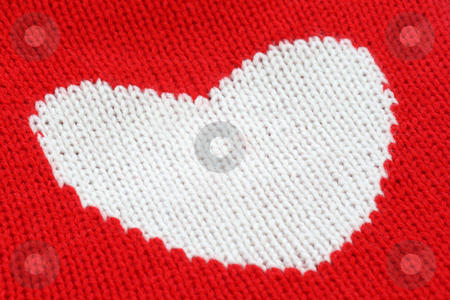 To use this stock image in your creative project, please select the size you need over to the right and click the "Add to Cart" button.
Your downloaded image will come with the Cutcaster watermark removed so don’t worry about the watermark you see on this page. Knitting Heart stock photo, Close up from white knitting heart on red. by Birgit Reitz-Hofmann