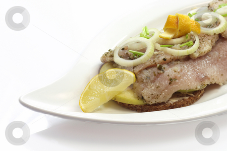 To use this stock image in your creative project, please select the size you need over to the right and click the "Add to Cart" button.
Your downloaded image will come with the Cutcaster watermark removed so don’t worry about the watermark you see on this page. Fresh herring stock photo, Gourmet young herring fillets. Studio Shot by Birgit Reitz-Hofmann