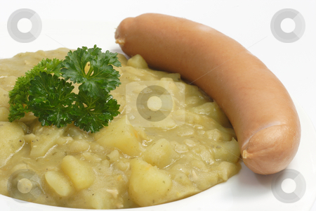 To use this stock image in your creative project, please select the size you need over to the right and click the "Add to Cart" button.
Your downloaded image will come with the Cutcaster watermark removed so don’t worry about the watermark you see on this page. Pea soup stock photo, Pea soup with pork sausages on bright background by Birgit Reitz-Hofmann