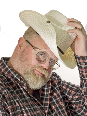 To use this stock image in your creative project, please select the size you need over to the right and click the "Add to Cart" button.
Your downloaded image will come with the Cutcaster watermark removed so don’t worry about the watermark you see on this page. Cowboy hat stock photo, Man with cowboy hat looking. Shot in studio by Birgit Reitz-Hofmann