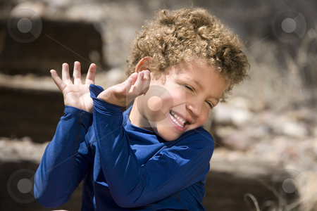 To use this stock image in your creative project, please select the size you need over to the right and click the "Add to Cart" button.
Your downloaded image will come with the Cutcaster watermark removed so don’t worry about the watermark you see on this page. Cute young boy stock photo, Portrait of cute boy with curly hair laughing outdoors by Scott Griessel