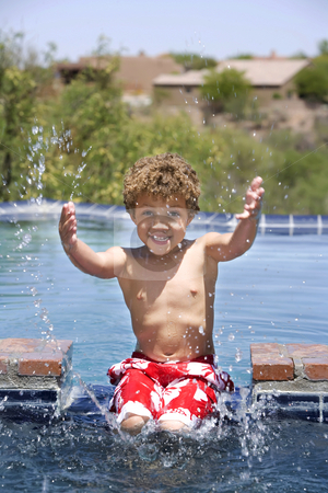 To use this stock image in your creative project, please select the size you need over to the right and click the "Add to Cart" button.
Your downloaded image will come with the Cutcaster watermark removed so don’t worry about the watermark you see on this page. Boy Splashing in a Pool stock photo, Cute young boy splashing in a swimming pool by Scott Griessel