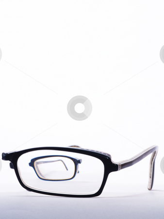 To use this stock image in your creative project, please select the size you need over to the right and click the "Add to Cart" button.
Your downloaded image will come with the Cutcaster watermark removed so don’t worry about the watermark you see on this page. Broken eyeglasses stock photo, Broken eyeglasses one half to be seen throug glass of the other half by Torsten Lorenz