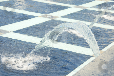 To use this stock image in your creative project, please select the size you need over to the right and click the "Add to Cart" button.
Your downloaded image will come with the Cutcaster watermark removed so don’t worry about the watermark you see on this page. Fountain stock photo, Fountain water falling in blue pool outdoor by Julija Sapic