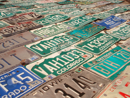 To use this stock image in your creative project, please select the size you need over to the right and click the "Add to Cart" button.
Your downloaded image will come with the Cutcaster watermark removed so don’t worry about the watermark you see on this page. Wall full of License Plates stock photo, A wall is covered with colorful license plates. by Ben O'Neal