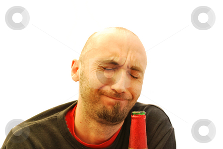 To use this stock image in your creative project, please select the size you need over to the right and click the "Add to Cart" button.
Your downloaded image will come with the Cutcaster watermark removed so don’t worry about the watermark you see on this page. Drunk stock photo, Young man drinking from a bottle of beer by Tudor Antonel adrian