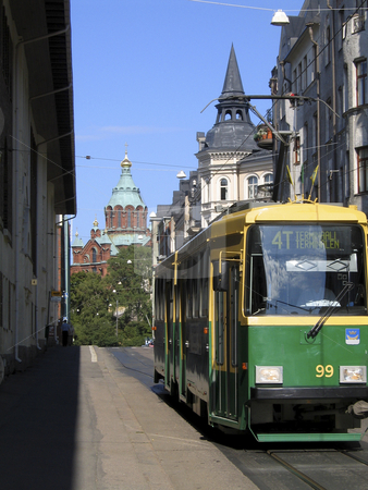 To use this stock image in your creative project, please select the size you need over to the right and click the "Add to Cart" button.
Your downloaded image will come with the Cutcaster watermark removed so don’t worry about the watermark you see on this page. Helsinki tram stock photo, Green and yellow tram in the streets of Helsinki with Uspensky cathedral in the background by Alessandro Rizzolli