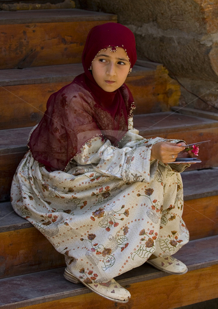 To use this stock image in your creative project, please select the size you need over to the right and click the "Add to Cart" button.
Your downloaded image will come with the Cutcaster watermark removed so don’t worry about the watermark you see on this page. Turkish girl stock photo, Turkish girl with traditional clothes by Kobby Dagan