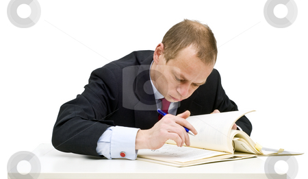 To use this stock image in your creative project, please select the size you need over to the right and click the "Add to Cart" button.
Your downloaded image will come with the Cutcaster watermark removed so don’t worry about the watermark you see on this page. Studying businessman stock photo, A businessman sweating over technical literature, expanding his knowledge through further studies by Corepics VOF