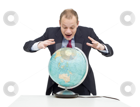 To use this stock image in your creative project, please select the size you need over to the right and click the "Add to Cart" button.
Your downloaded image will come with the Cutcaster watermark removed so don’t worry about the watermark you see on this page. Global fortune stock photo, A businessman, hovering over a globe as if if looking at a fortune teller's sphere, seeing the possibilities and potential of emerging markets and global business by Corepics VOF