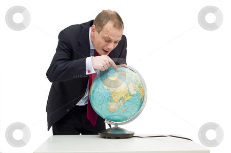 To use this stock image in your creative project, please select the size you need over to the right and click the "Add to Cart" button.
Your downloaded image will come with the Cutcaster watermark removed so don’t worry about the watermark you see on this page. Discovering global business stock photo, A businessman discovering the potential of global business, visualised by his expression and pointing finger on the globe on the table in front of him. by Corepics VOF