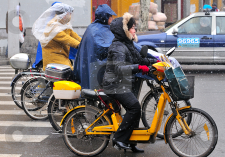 To use this stock image in your creative project, please select the size you need over to the right and click the "Add to Cart" button.
Your downloaded image will come with the Cutcaster watermark removed so don’t worry about the watermark you see on this page. Chinese motorcyclists stock photo, Chinese motorcyclist in shanghai street in a snowy day by Kobby Dagan
