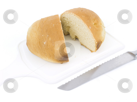 To use this stock image in your creative project, please select the size you need over to the right and click the "Add to Cart" button.
Your downloaded image will come with the Cutcaster watermark removed so don’t worry about the watermark you see on this page. Sliced Bread Loaf stock photo, Sliced Bread Loaf on a White Background by John Teeter