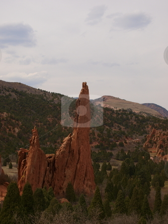 To use this stock image in your creative project, please select the size you need over to the right and click the "Add to Cart" button.
Your downloaded image will come with the Cutcaster watermark removed so don’t worry about the watermark you see on this page. Red Rock Formation stock photo, Color image of a red rock formation in Garden of The Gods park Colorado. by Michael Rice