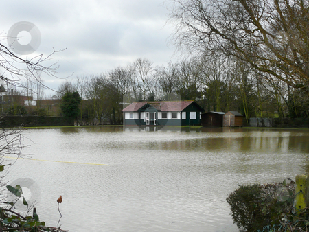 To use this stock image in your creative project, please select the size you need over to the right and click the "Add to Cart" button.
Your downloaded image will come with the Cutcaster watermark removed so don’t worry about the watermark you see on this page. Flooded Bowling Green stock photo, Witham, Essex, UK - Feb 10. The local green bowls club loses its' perfectly manicured bowling green to flood waters from the nearby river. by Helen Shorey