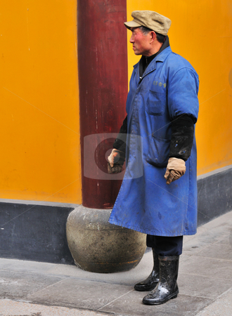 To use this stock image in your creative project, please select the size you need over to the right and click the "Add to Cart" button.
Your downloaded image will come with the Cutcaster watermark removed so don’t worry about the watermark you see on this page. Chinese buddhist shrine stock photo, Worker in Chinese buddhist shrine in the city of Shanghai China by Kobby Dagan