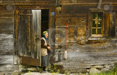 To use this stock image in your creative project, please select the size you need over to the right and click the "Add to Cart" button.
Your downloaded image will come with the Cutcaster watermark removed so don’t worry about the watermark you see on this page. Old turkish woman stock photo, Old turkish woman near here house in east Turkey by Kobby Dagan