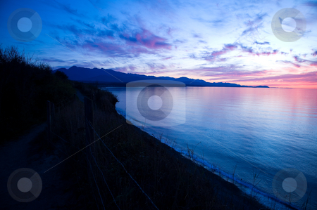 To use this stock image in your creative project, please select the size you need over to the right and click the "Add to Cart" button.
Your downloaded image will come with the Cutcaster watermark removed so don’t worry about the watermark you see on this page. Strait of Juan de Fuca Sunset stock photo, A beautiful sunset over the Strait of Juan de Fuca in Sequim, Washington. by Travis Manley